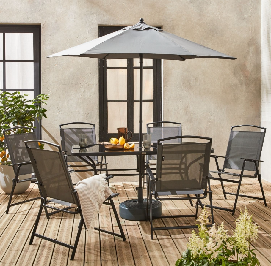 Mesa de jardín de acero con 6 sillas y sombrilla por 251,99 €